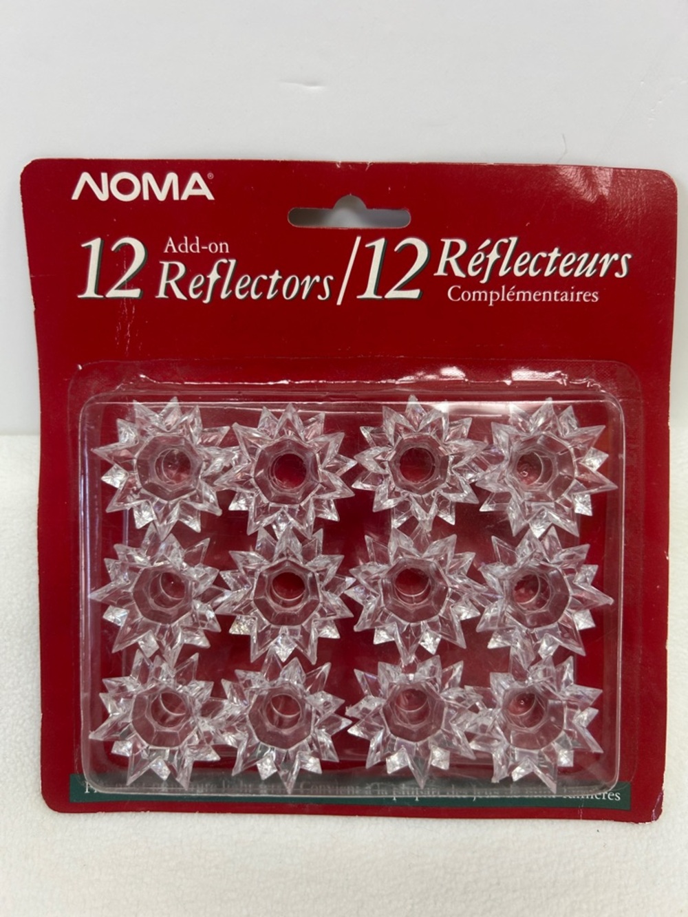 Vintage unopened single pack of 12 add on miniature light set reflectors by NOMA